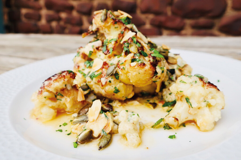 Roasted cauliflower with tahini and maple dressing