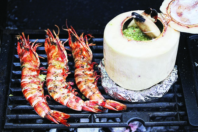 Barbecued seafood curry in a coconut