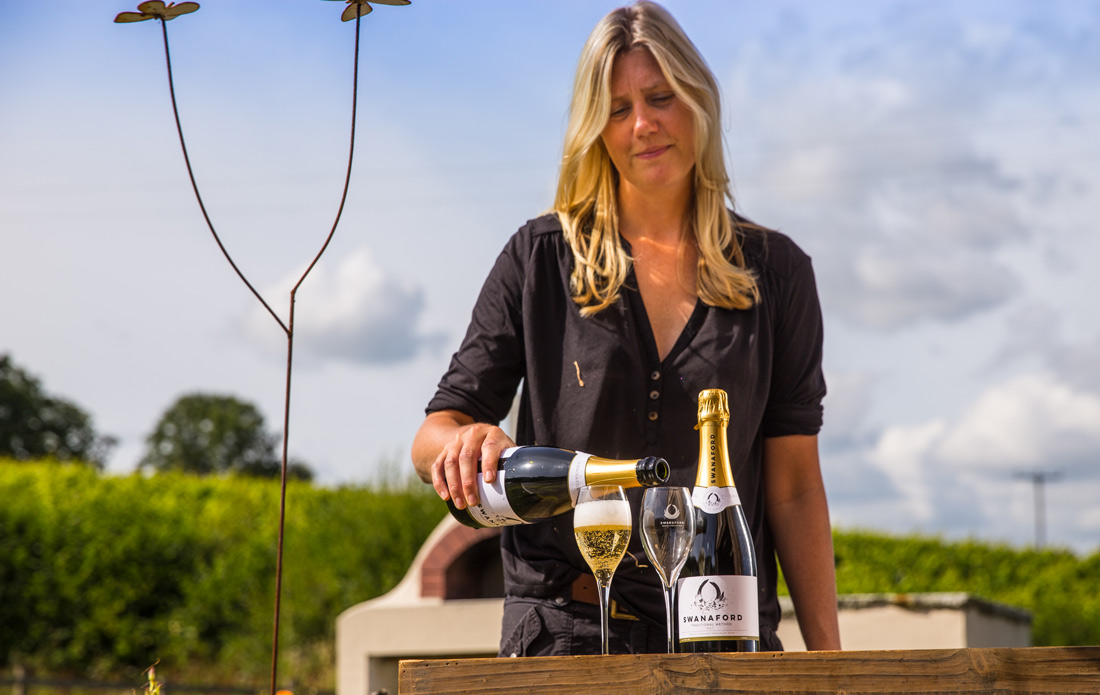 Swanaford, lady pouring wine, devon vineyard