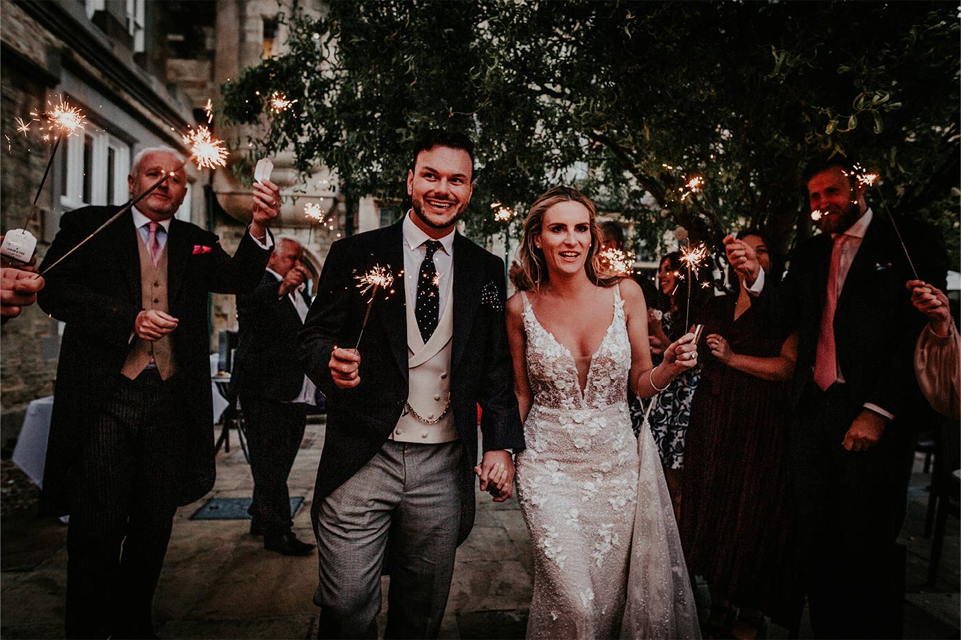 Tom and Chloe celebrating on The Alverton's terrace